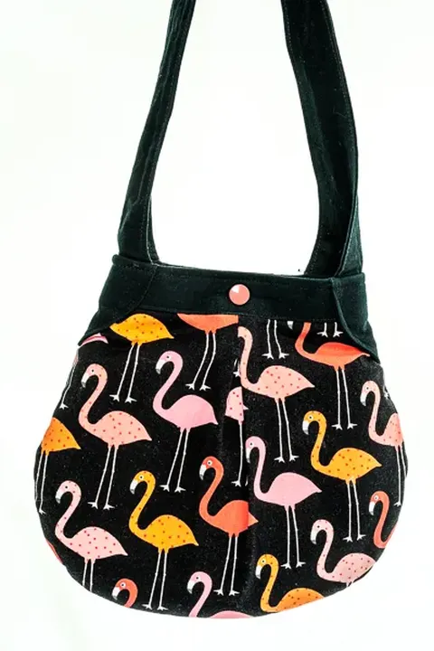 Handtasche in Beutelform mit Flamingo Print - Bild 1