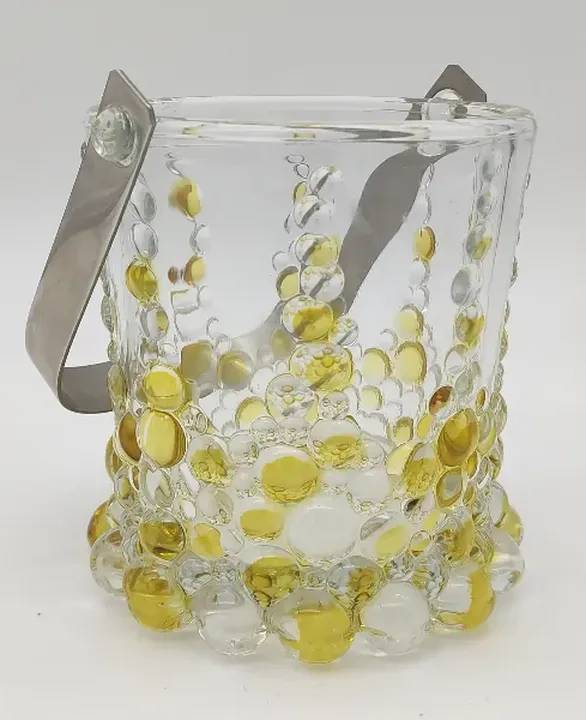 Glasbehätlnis mit gelb/weißen Kügelchen  - Bild 1